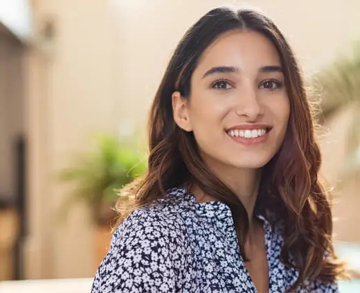 Smiling young woman with healthy teeth